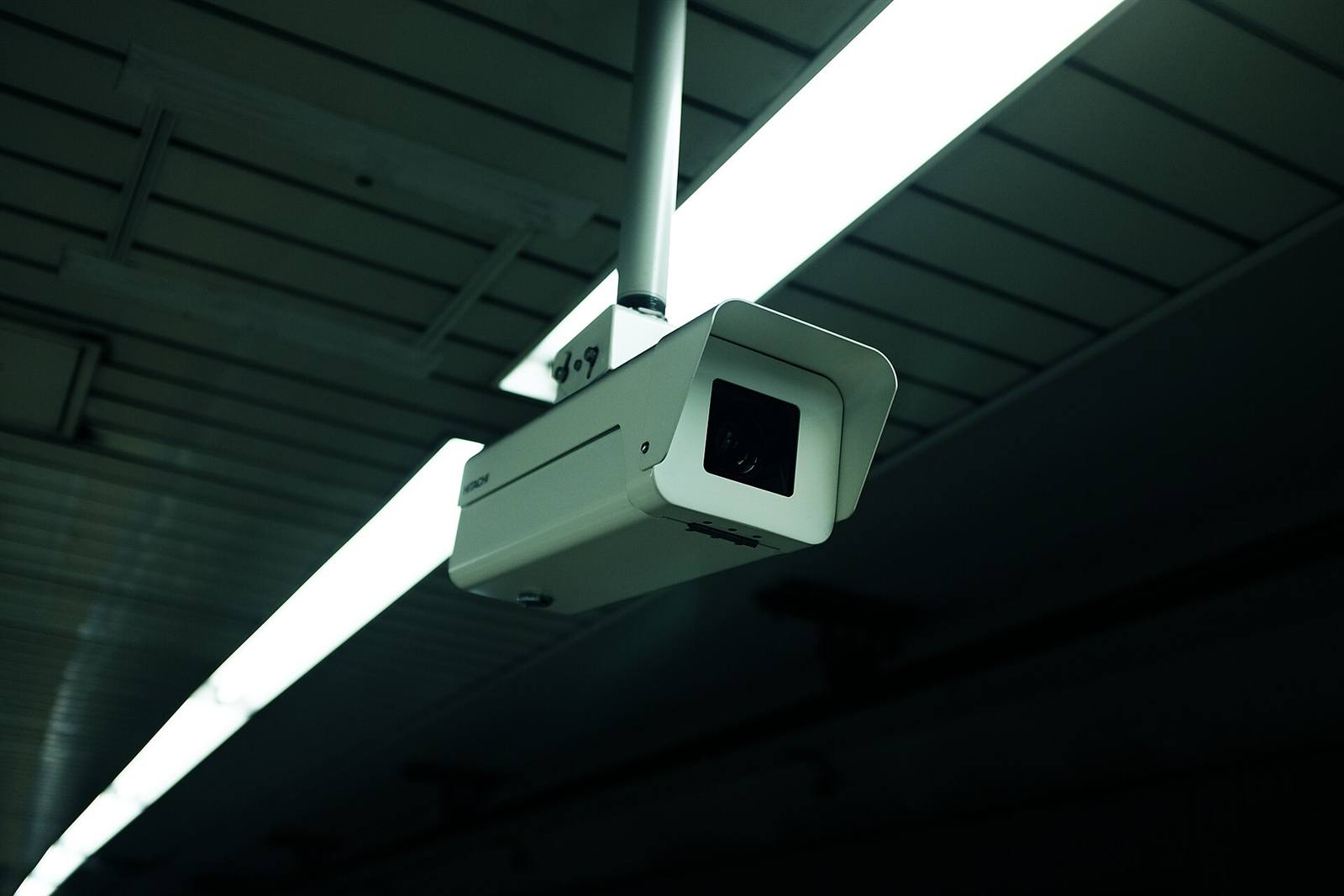 CCTV security camera mounted on a ceiling